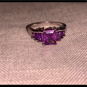 Emerald cut purple ring